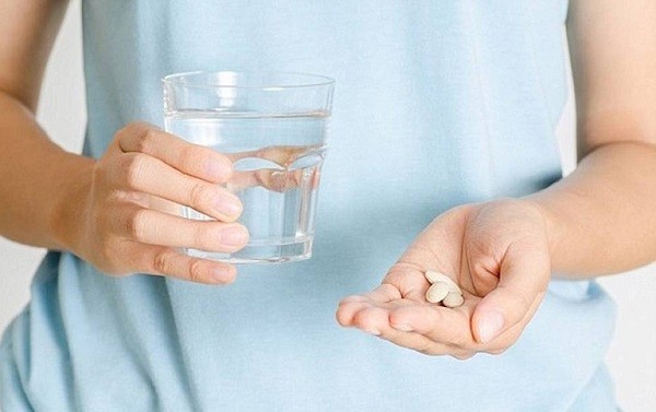 cách giảm đau sau khi phẫu thuật cắt nướu